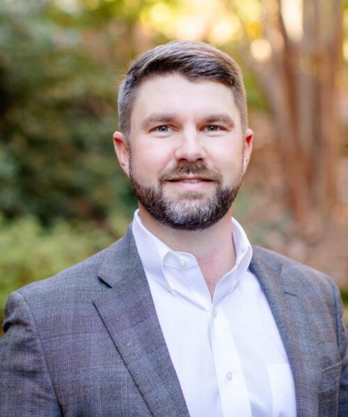 Jack Little Wearing A Suit And Tie