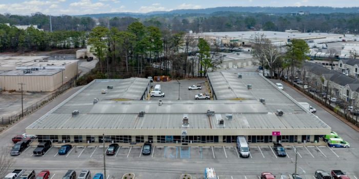A Group Of People In A Parking Lot