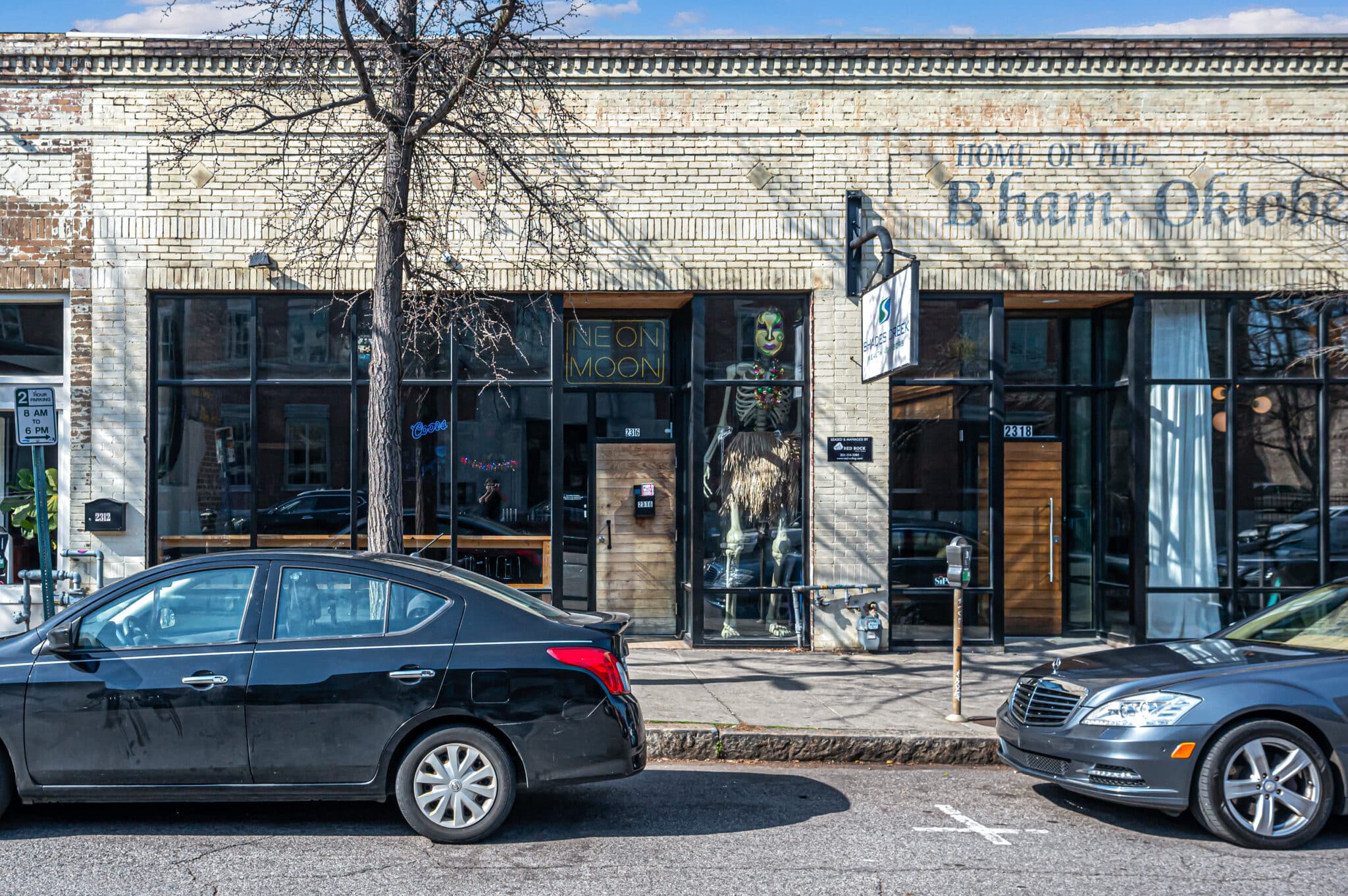 a car parked in front of a building
