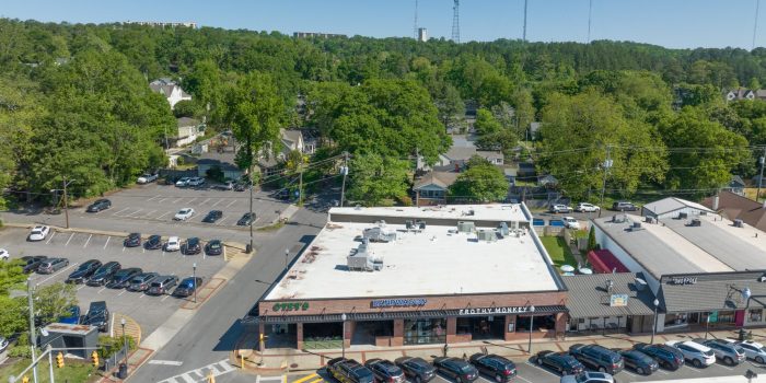 A Group Of People In A Parking Lot
