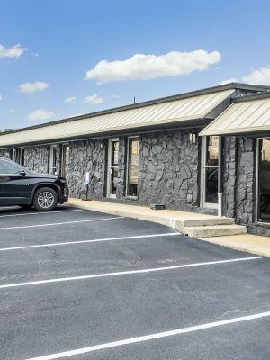 A Car Parked In A Parking Lot