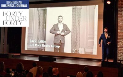A Group Of People Standing In Front Of A Window