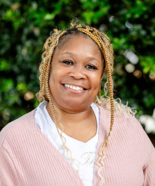 A Person Smiling For The Camera
